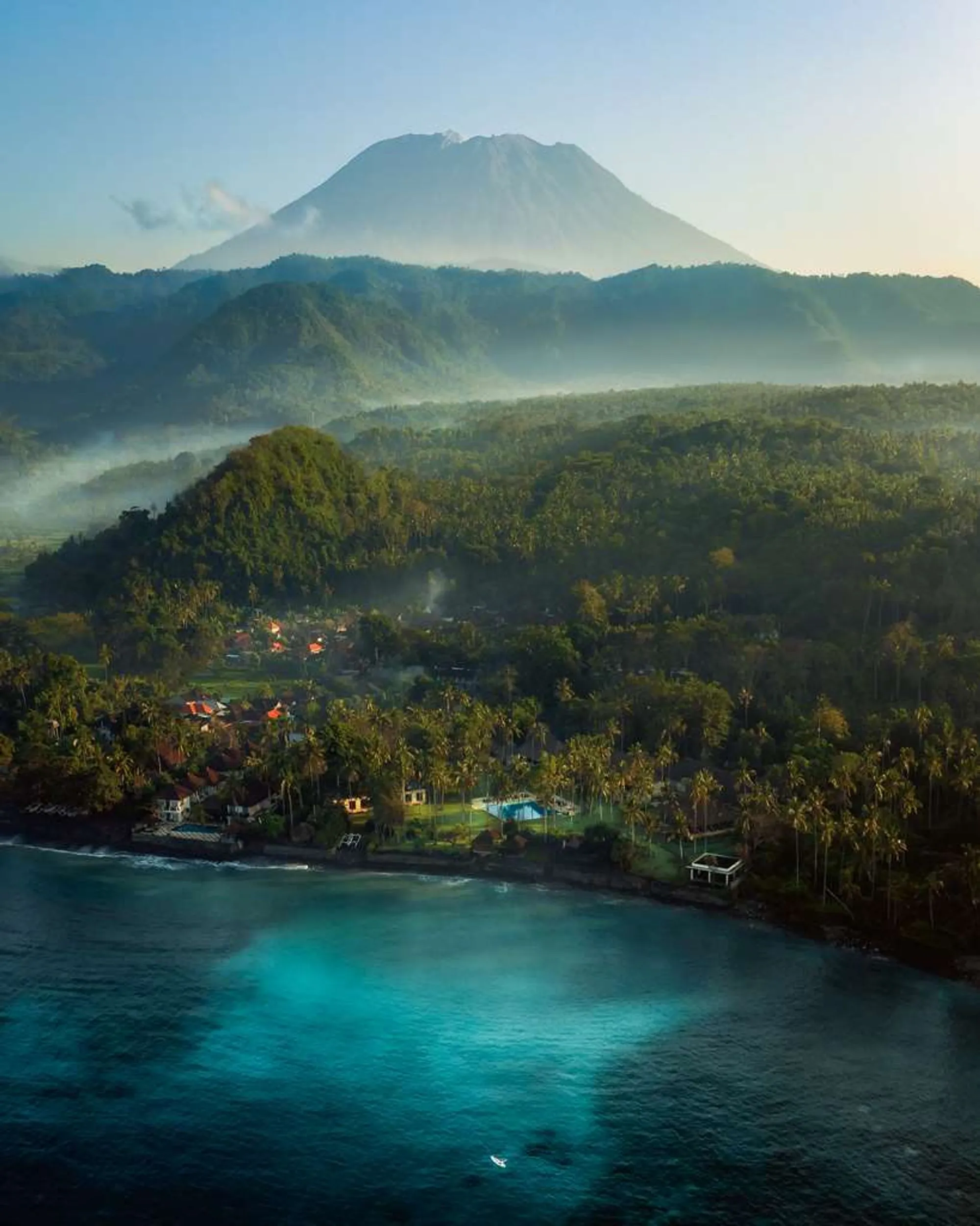 Alila Manggis, Karangasem Bali - beachfront resort exterior and palms