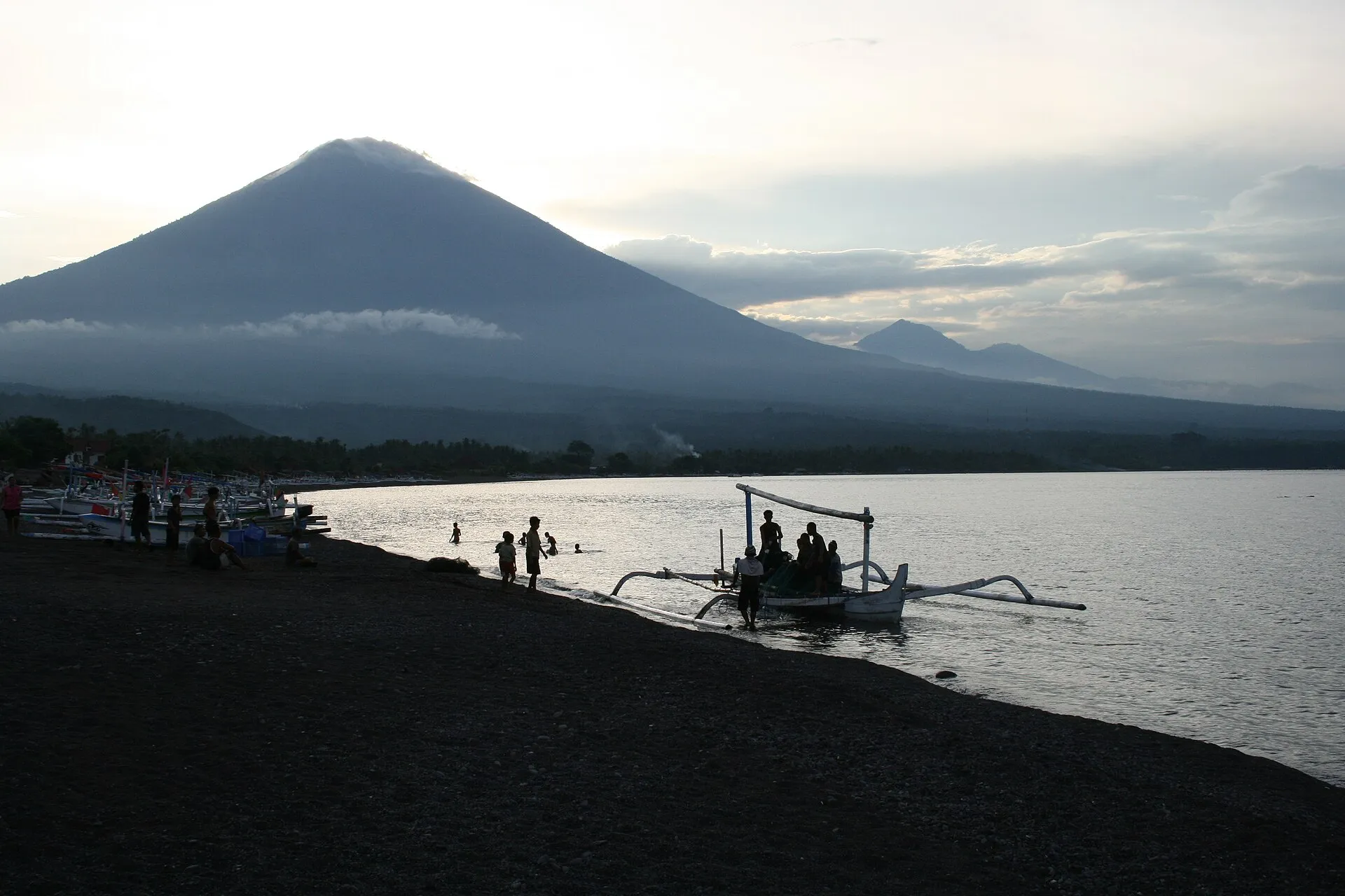 Amed, Karangasem Bali - beach sunset with shoreline boats
